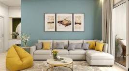 The Luxurious brown motif and the plush heaboard of this Bedroom take elegance